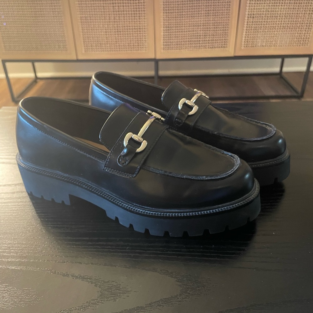 Black Leather Loafers with Silver Buckle